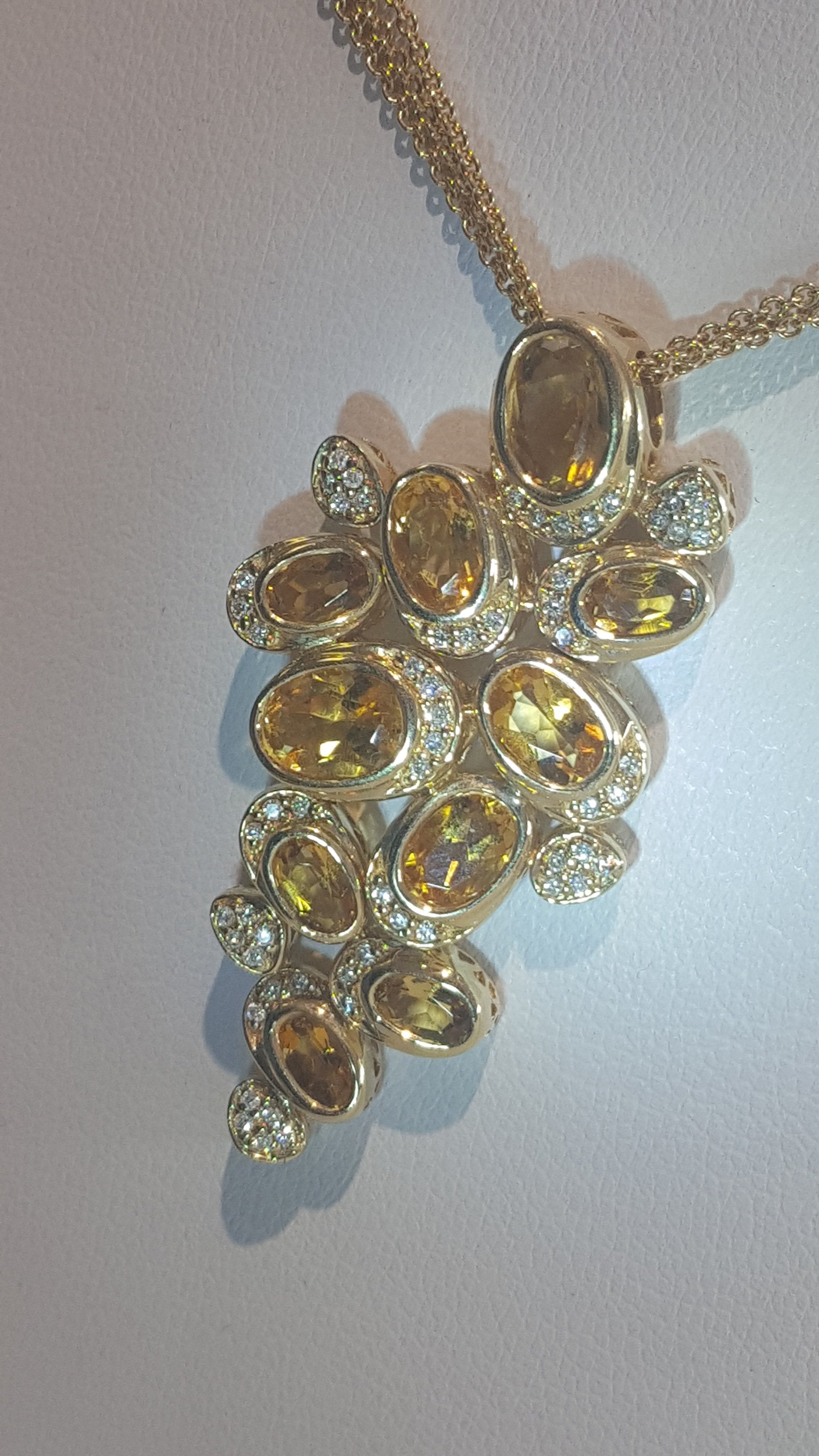 Articulated Topaz and diamond necklace